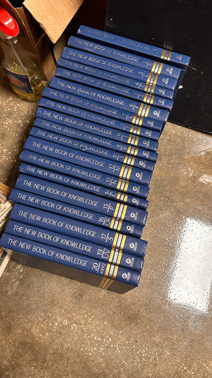 The New Book of Knowledge encyclopedia volumes - 2002