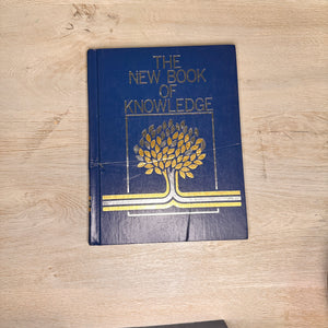 The New Book of Knowledge encyclopedia volumes - 2002