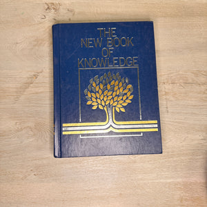 The New Book of Knowledge encyclopedia volumes - 2002