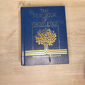 The New Book of Knowledge encyclopedia volumes - 2002