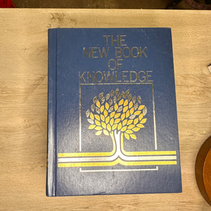 The New Book of Knowledge encyclopedia volumes - 2002