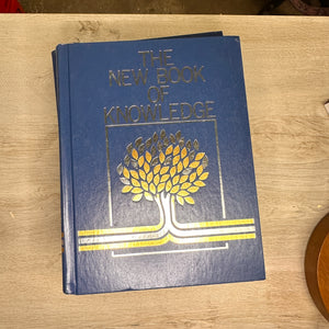 The New Book of Knowledge encyclopedia volumes - 2002