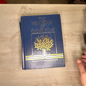 The New Book of Knowledge encyclopedia volumes - 2002