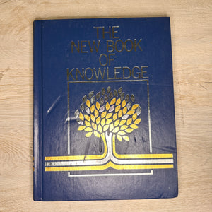 The New Book of Knowledge encyclopedia volumes - 2002