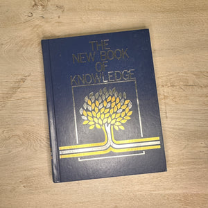 The New Book of Knowledge encyclopedia volumes - 2002