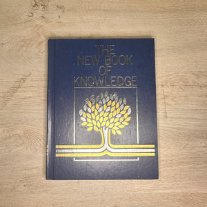 The New Book of Knowledge encyclopedia volumes - 2002