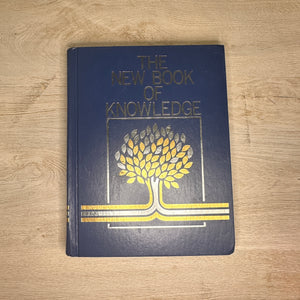 The New Book of Knowledge encyclopedia volumes - 2002