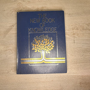 The New Book of Knowledge encyclopedia volumes - 2002