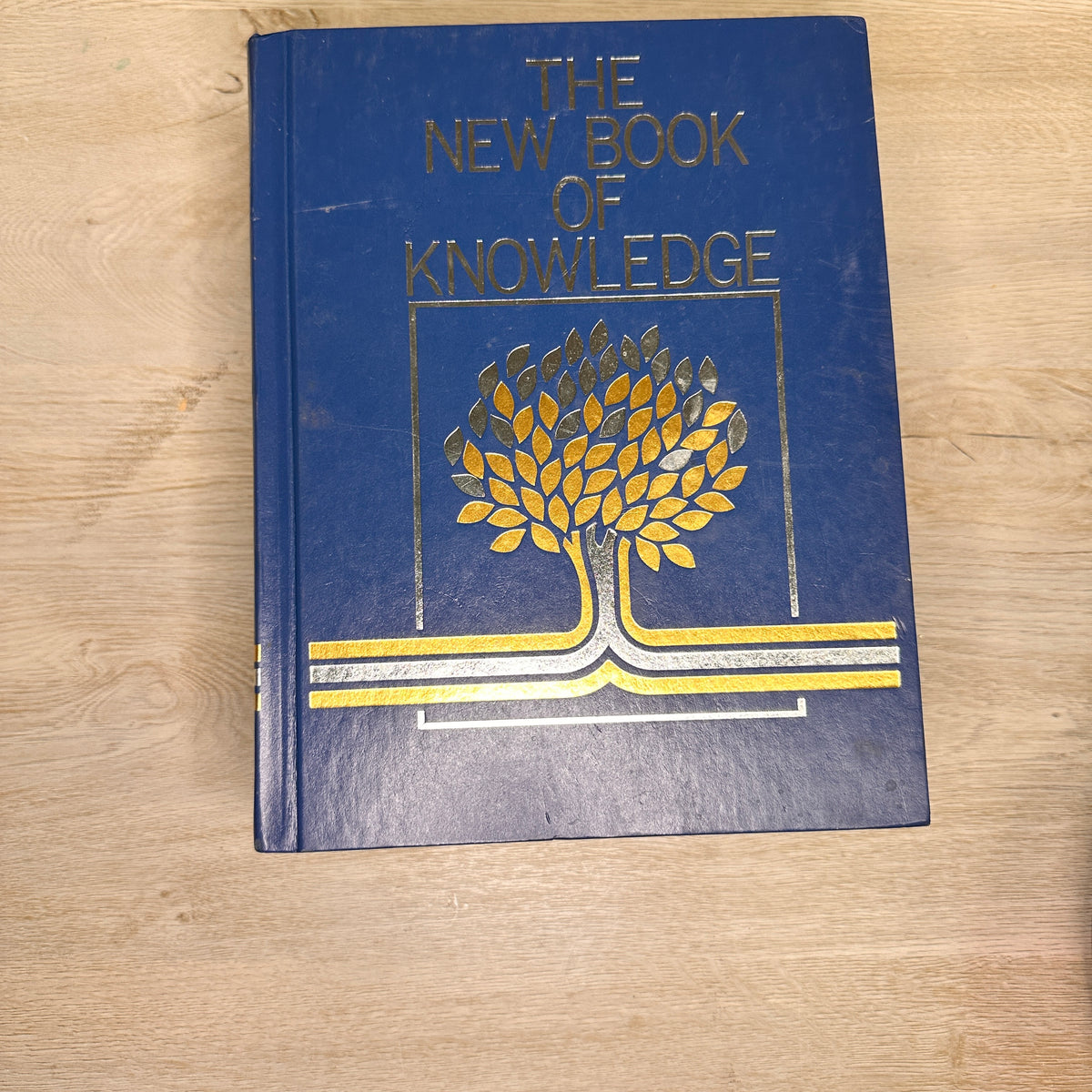 The New Book of Knowledge encyclopedia volumes - 2002