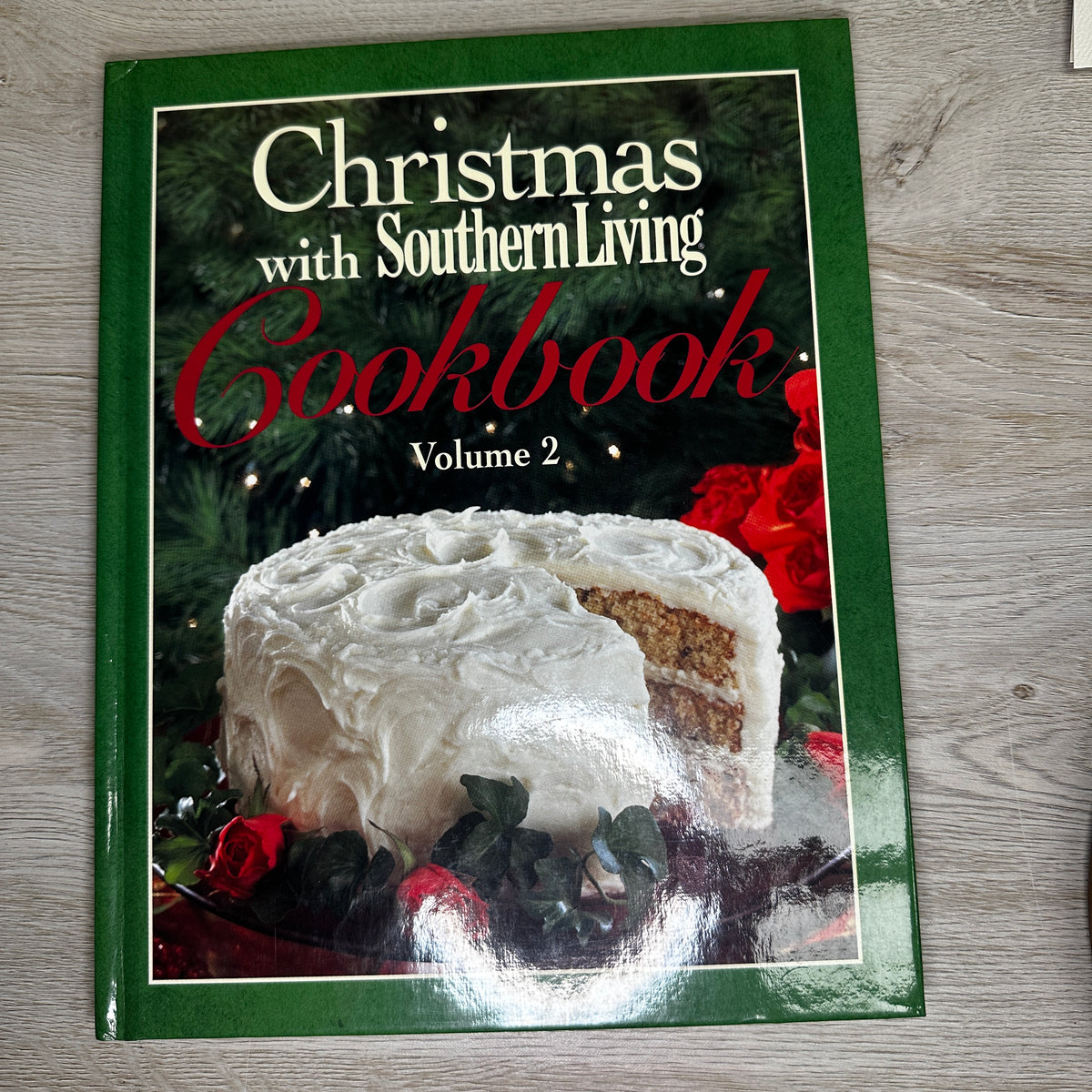 Cookbook titled 'Christmas with Southern Living Cookbook Volume 2' featuring a cake on the cover.