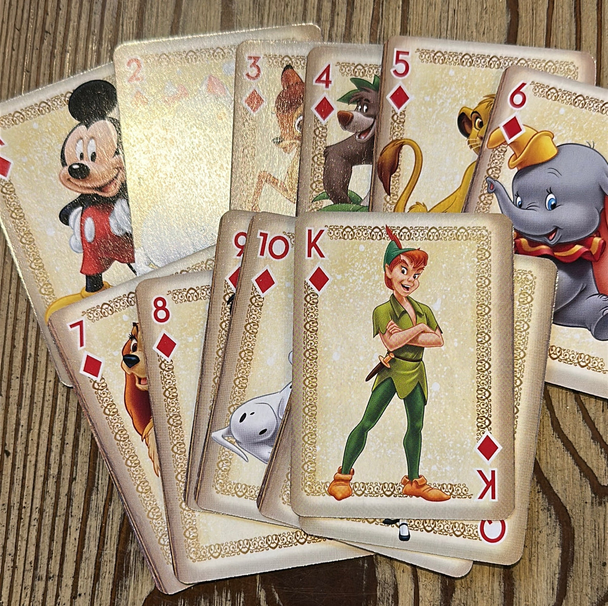 Disney characters  playing cards