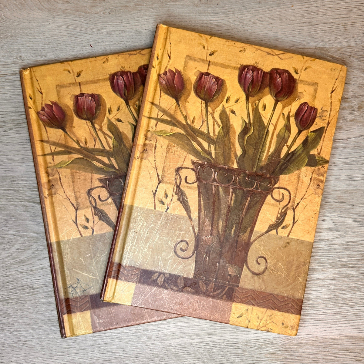 journal with flowers in vase